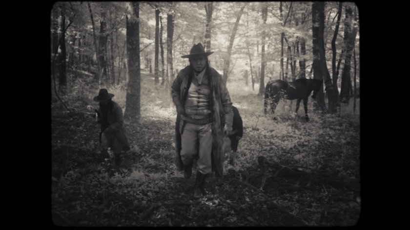 Lighthorsemen in woods.