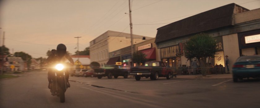 Maya on her motorcycle in downtown Tamaha.