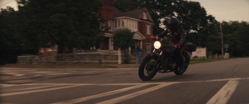 Maya on her motorcycle in downtown Tamaha.