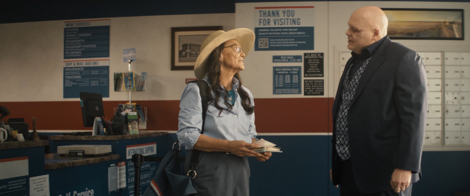Chula talks to Fisk inside Tamaha post office.