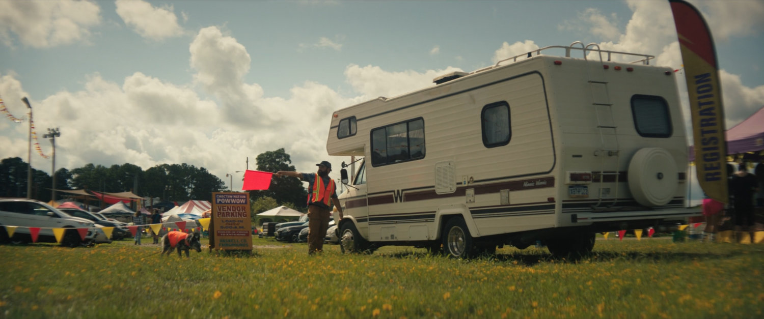 Biscuits directs an RV at the Choctaw Nation PowWow.