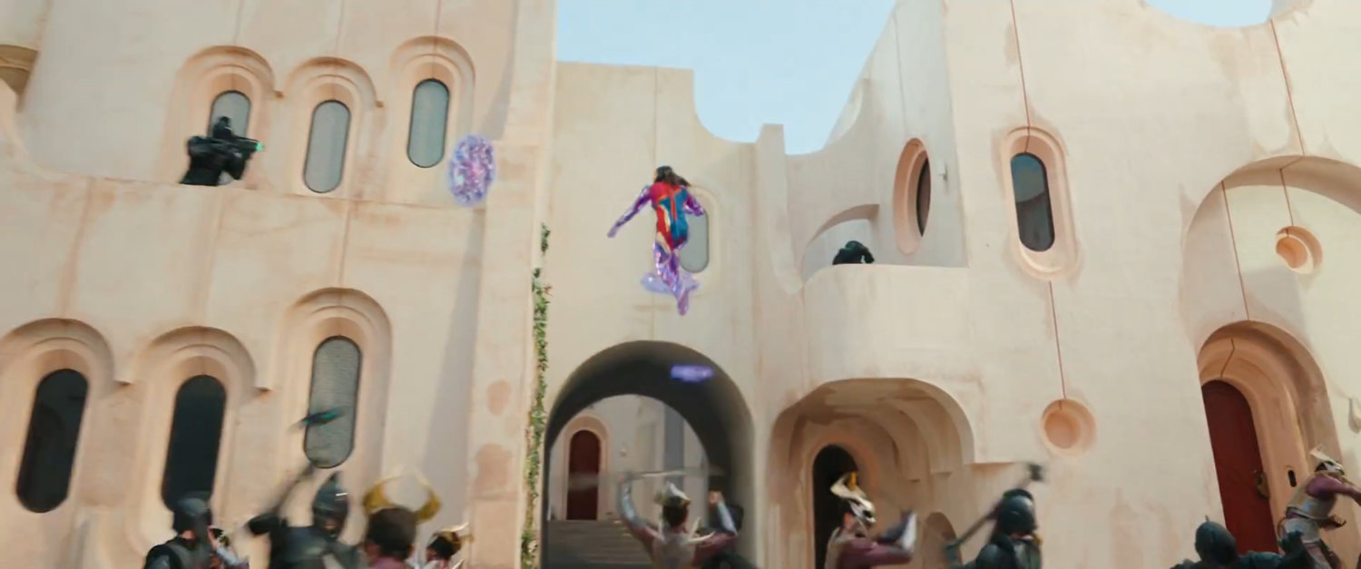 Kamala using powers to climb onto a balcony.