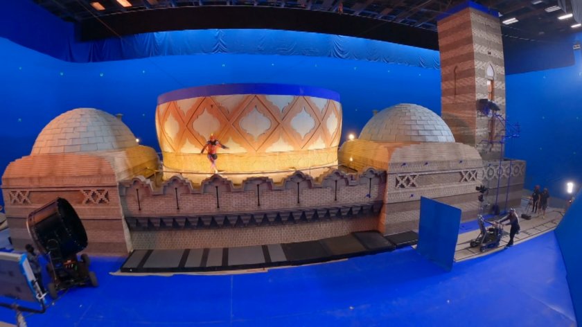 Behind-the-scenes image of Kamala walking on roof of Jersey City mosque.