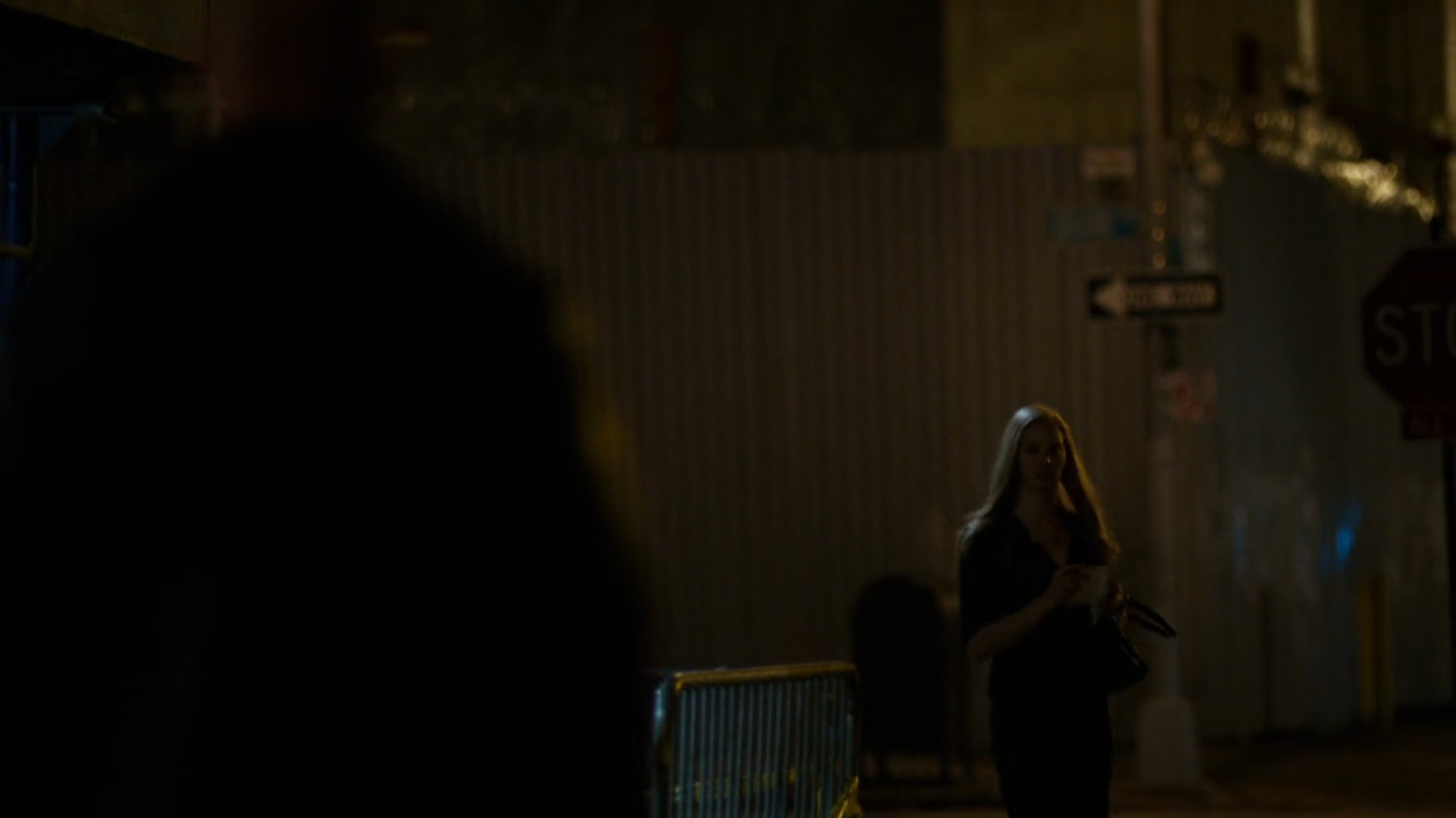 Karen outside Elena Cardenas' apartment.