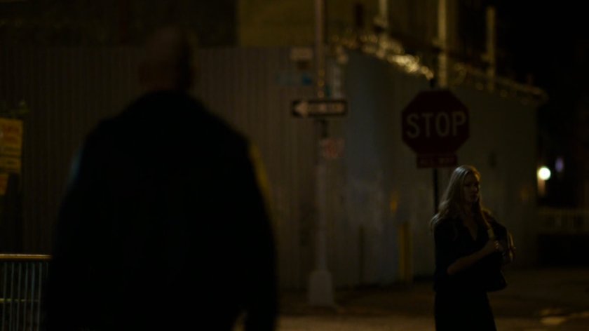 Karen and a man outside Elena Cardenas' apartment.