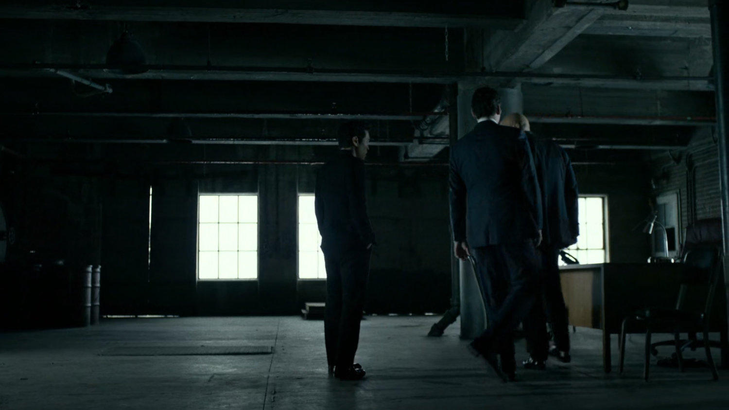 Fisk, Wesley, and Nobu meet inside warehouse at Pier 81.