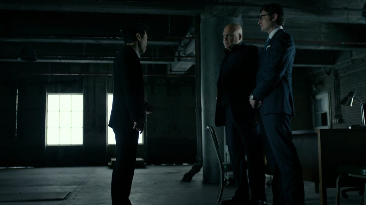 Fisk, Wesley, and Nobu meet inside warehouse at Pier 81.