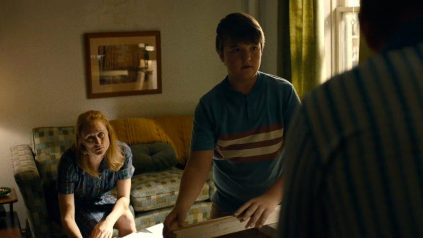 Marlene and young Wilson Fisk inside their apartment.