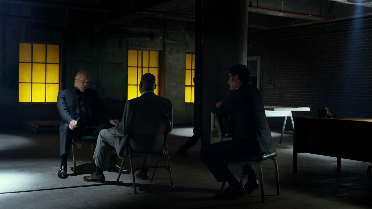 Fisk, Wesley, and Hoffman meet inside warehouse at Pier 81.