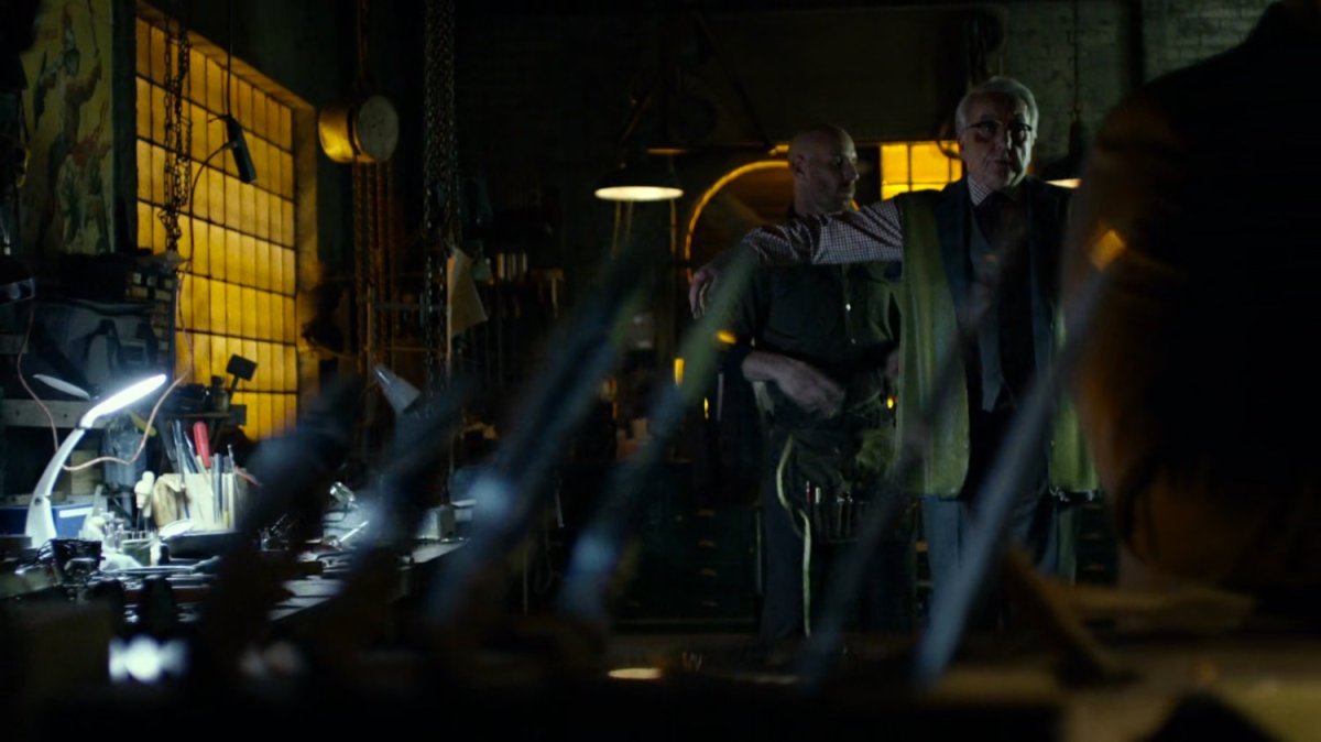 Owlsley and Melvin Potter inside his workshop.