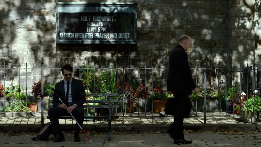 Matt and Father Lantom outside church.