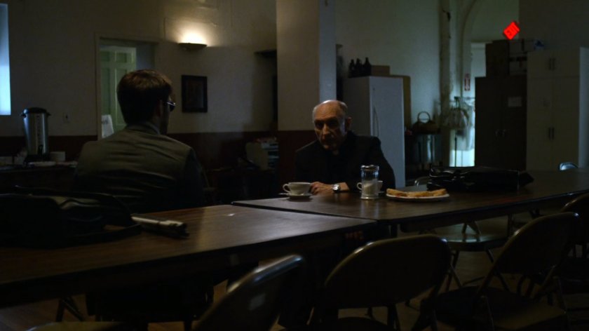 Matt and Father Lantom in church kitchen.