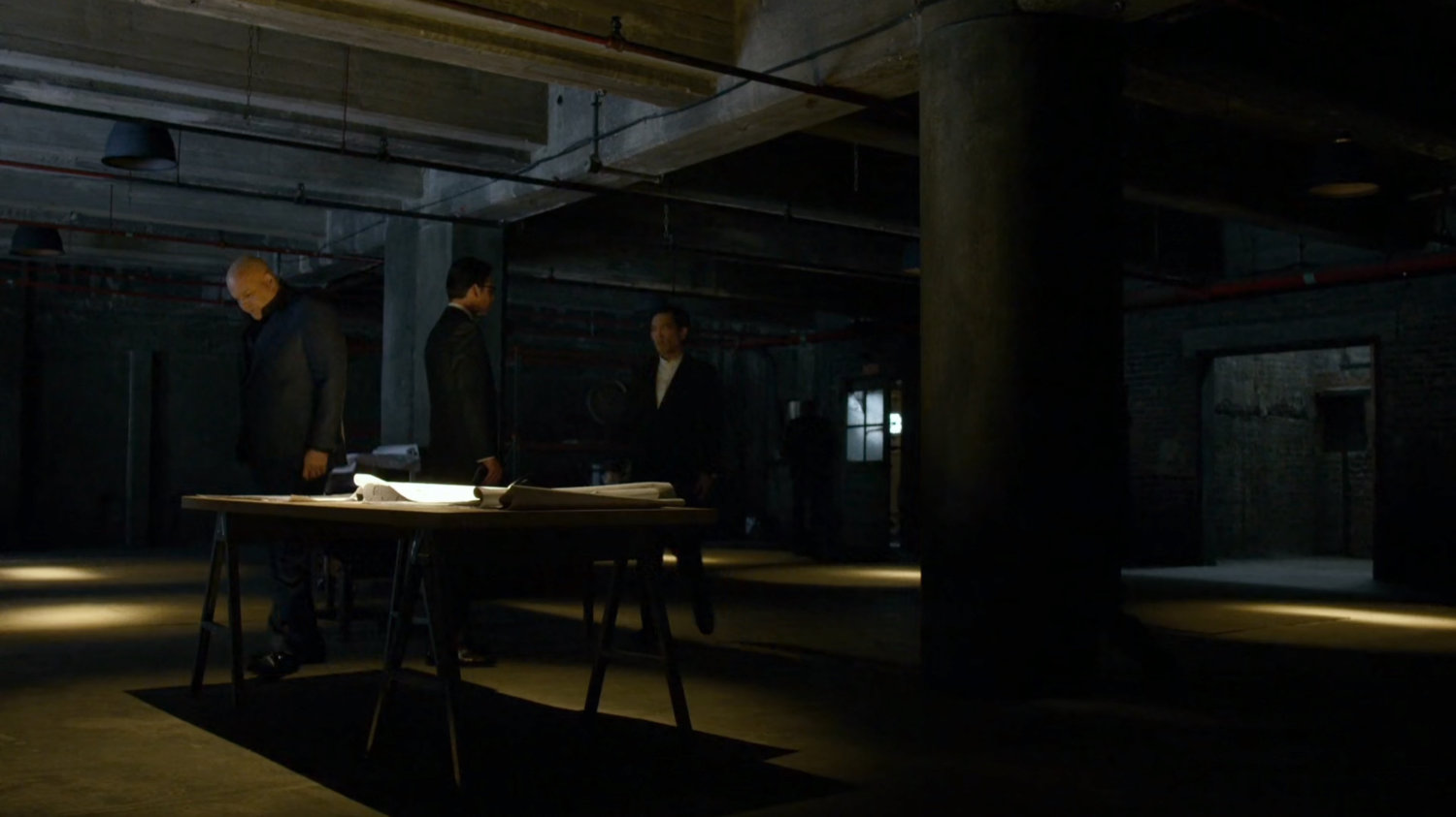 Fisk, Wesley, and Nobu inside warehouse at Pier 81.