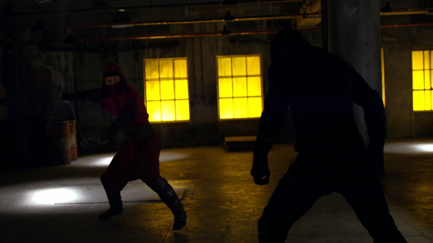 Nobu fights Daredevil inside warehouse at Pier 81.