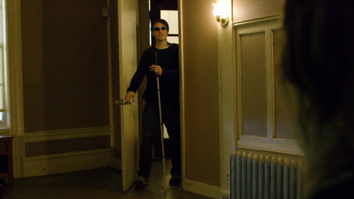 College-age Matt enters a dorm room.