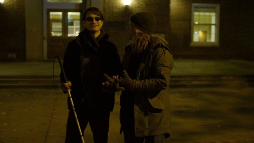 College-aged Matt and Foggy in college quad at night.