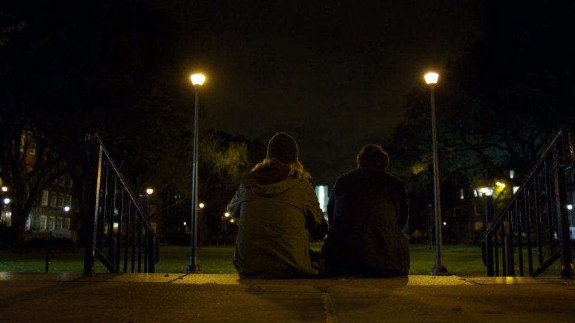 College-aged Matt and Foggy in college quad at night.