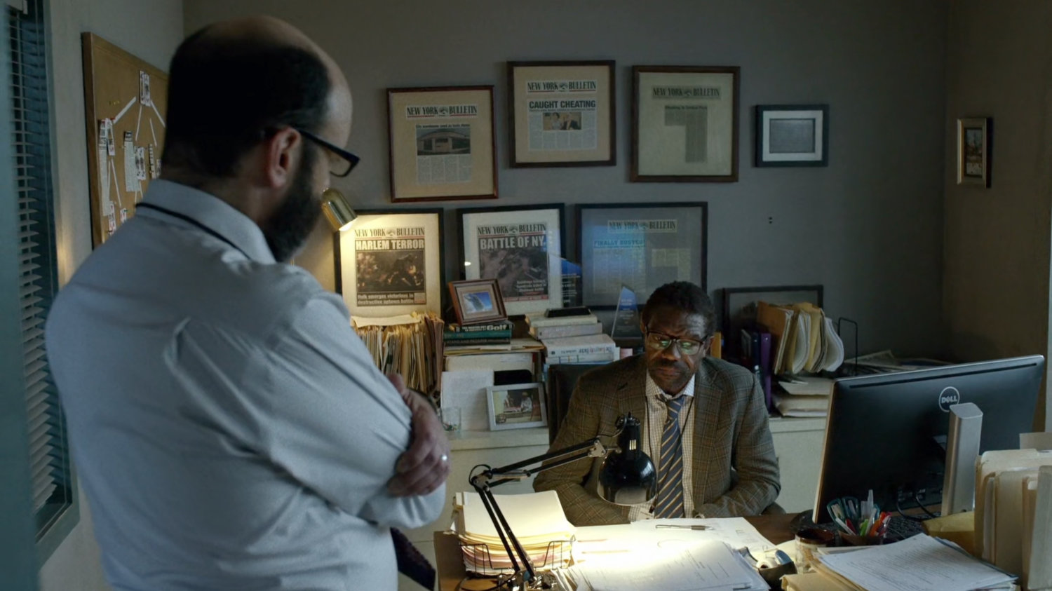 Mitchell and Ben in Ben's office.