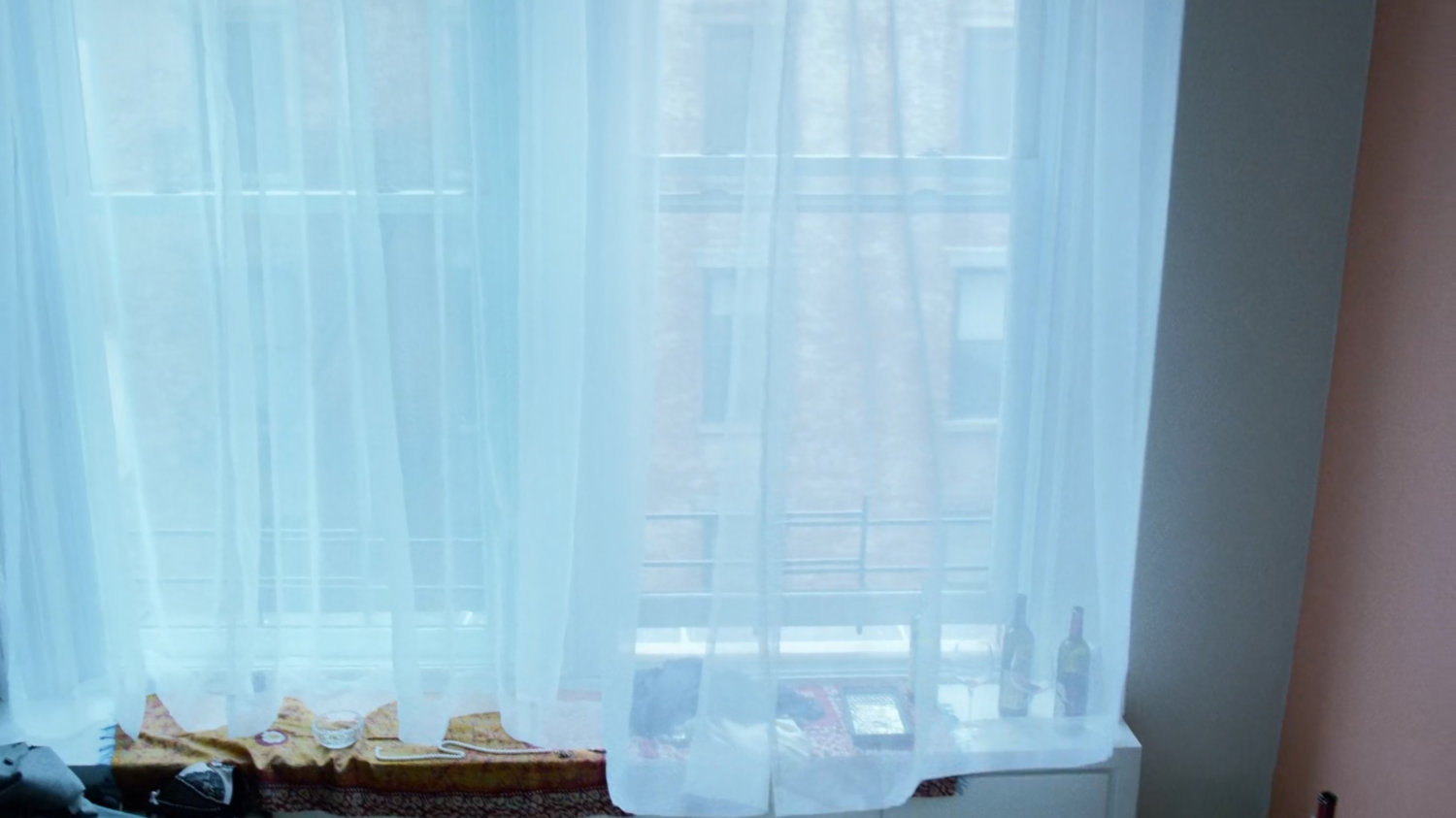 Curtains and window in Marcie Stahl apartment.