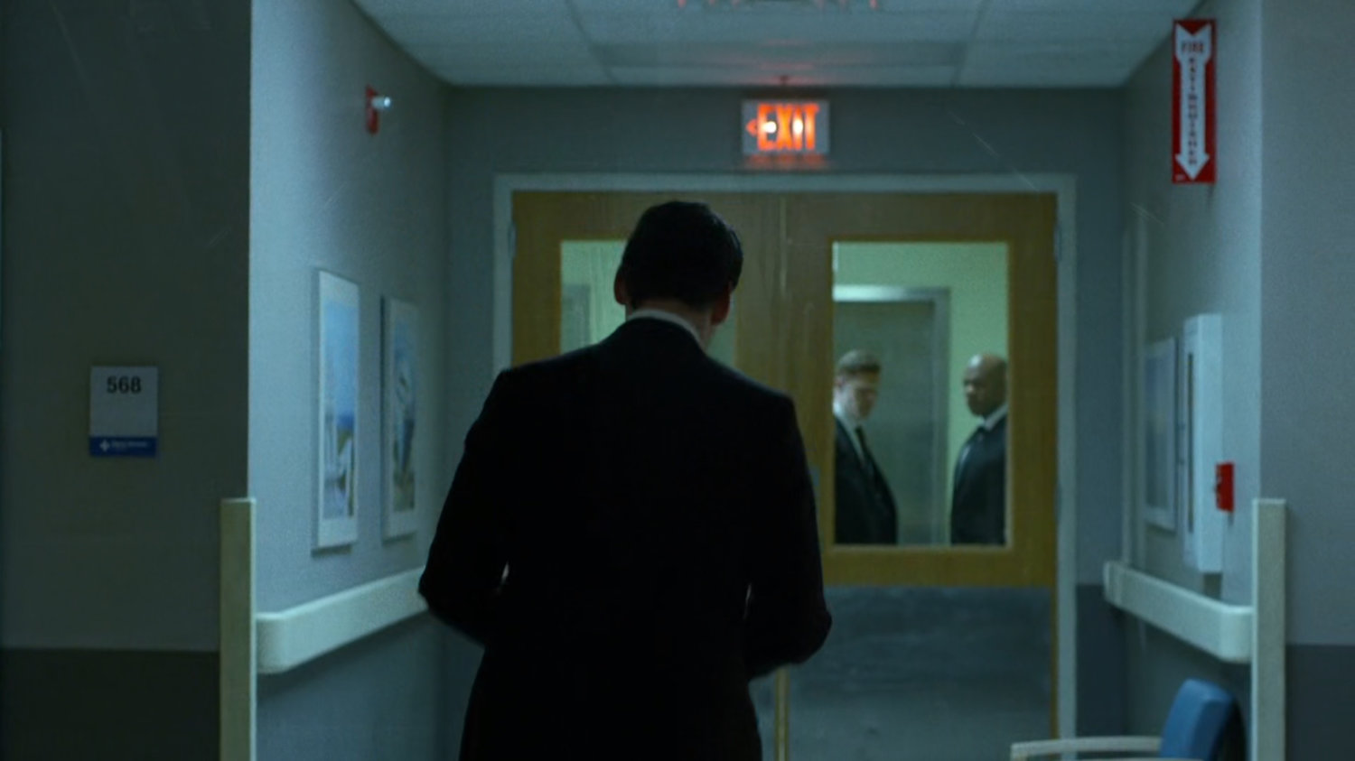 Wesley in a Metro-General hospital hallway.