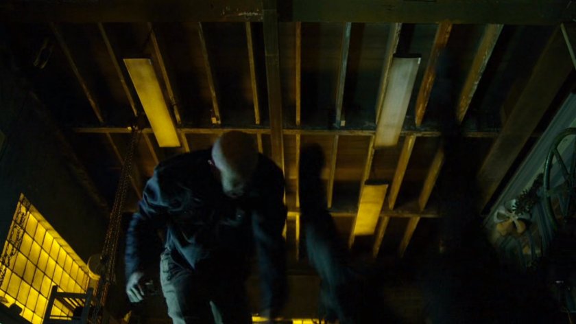 Melvin potter fights the Man in Black in his workshop.