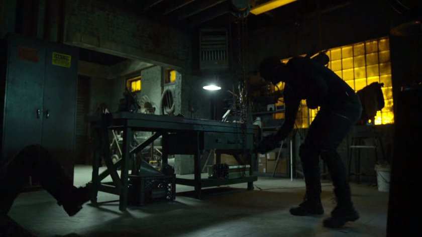 Melvin potter fights the Man in Black in his workshop.