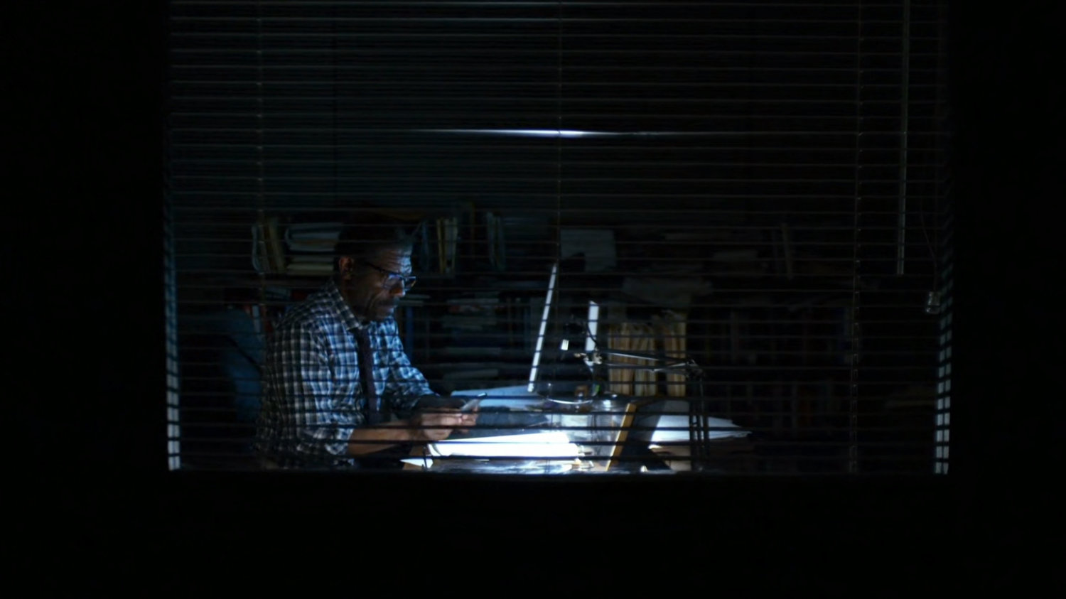Ben working late in his office.