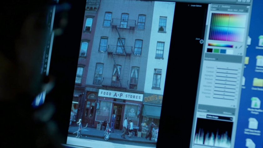 Picture of old neighborhood in image editing software on computer.