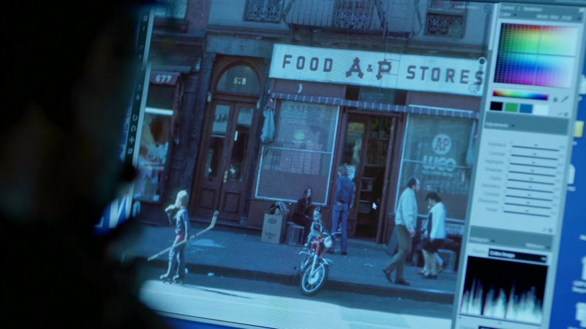 Picture of old neighborhood in image editing software on computer.