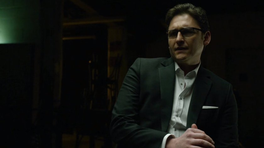 Wesley in dark basement.