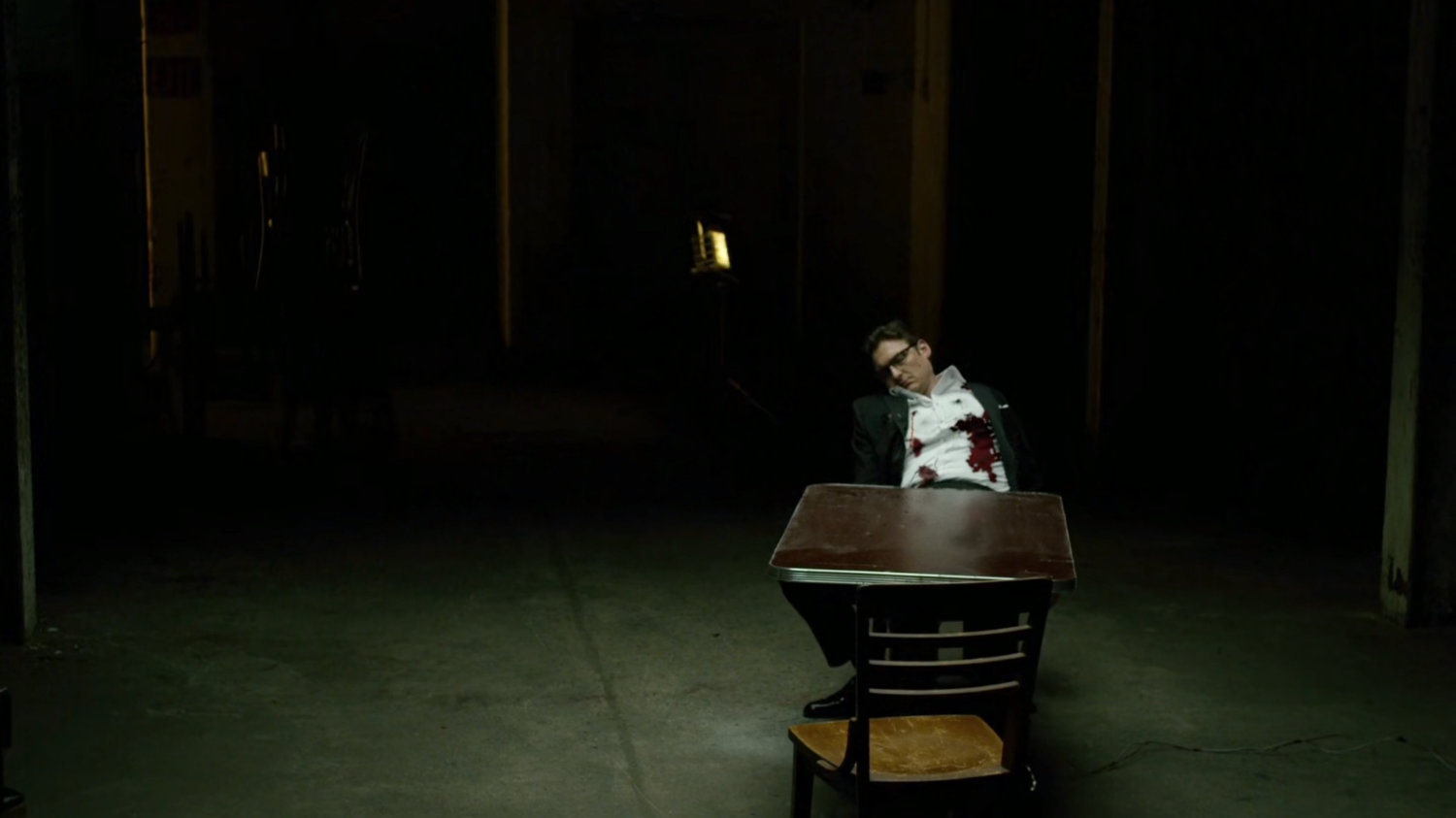 Wesley dead, in a dark basement.