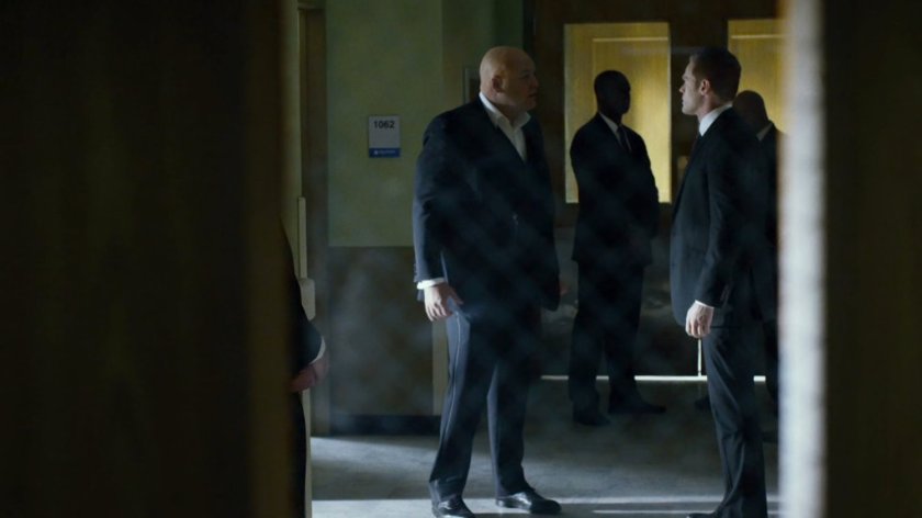 Fisk and Francis in a Metro-General hospital hallway.