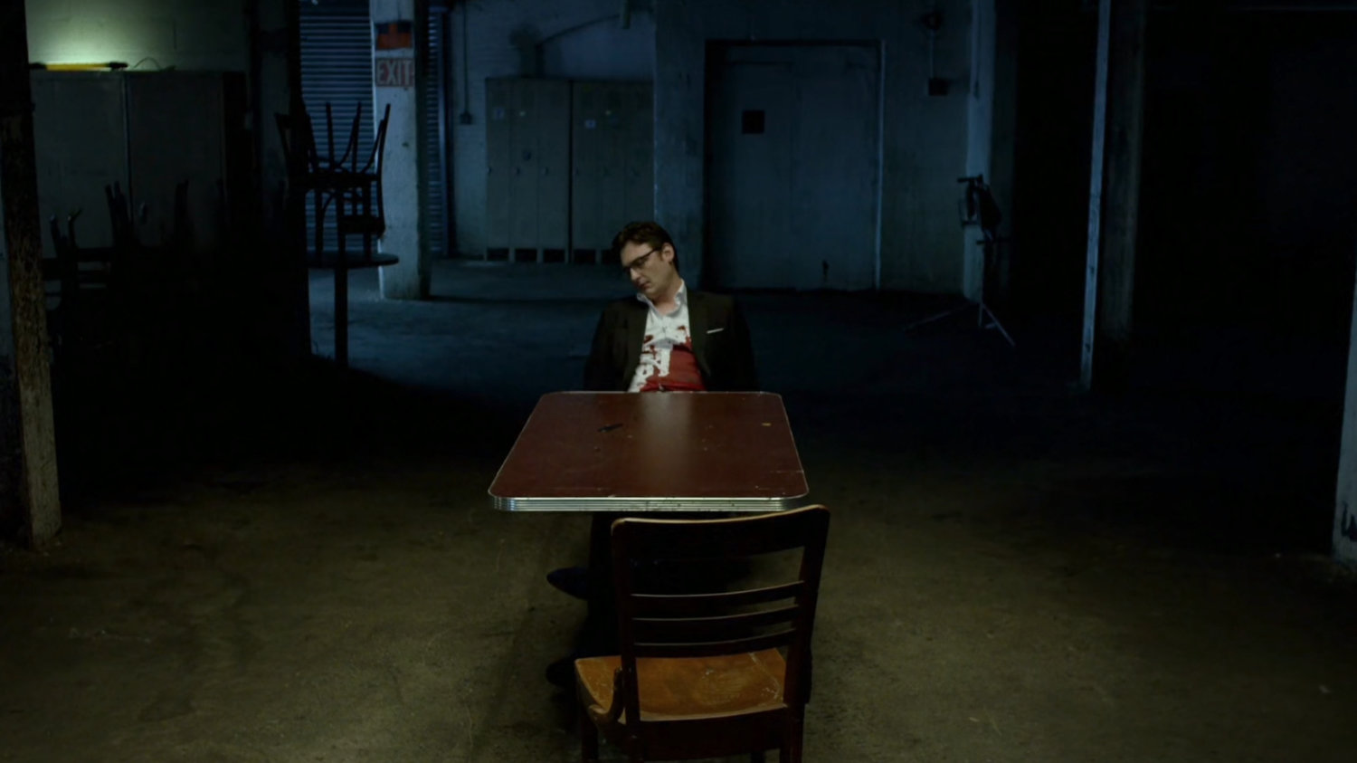 Wesley's body in a dark basement.