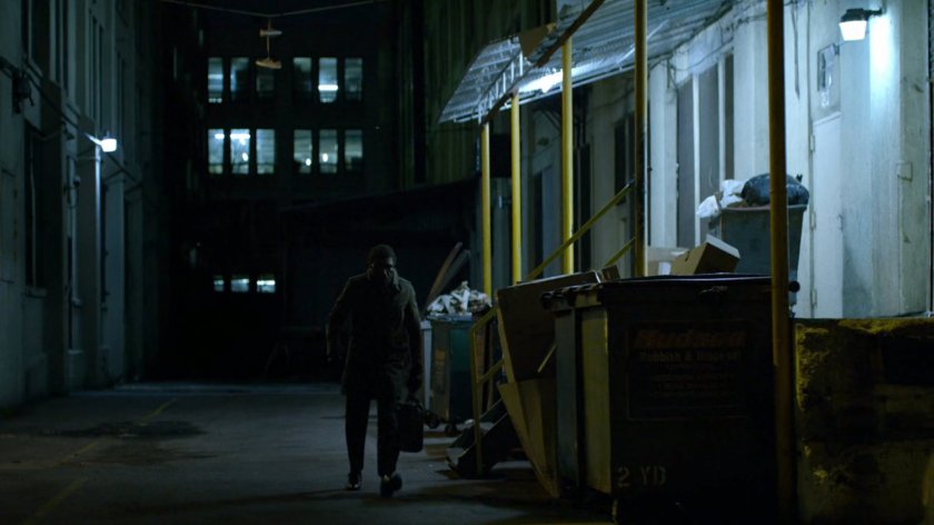 Ben walking in alley by parking lot of New York Bulletin.