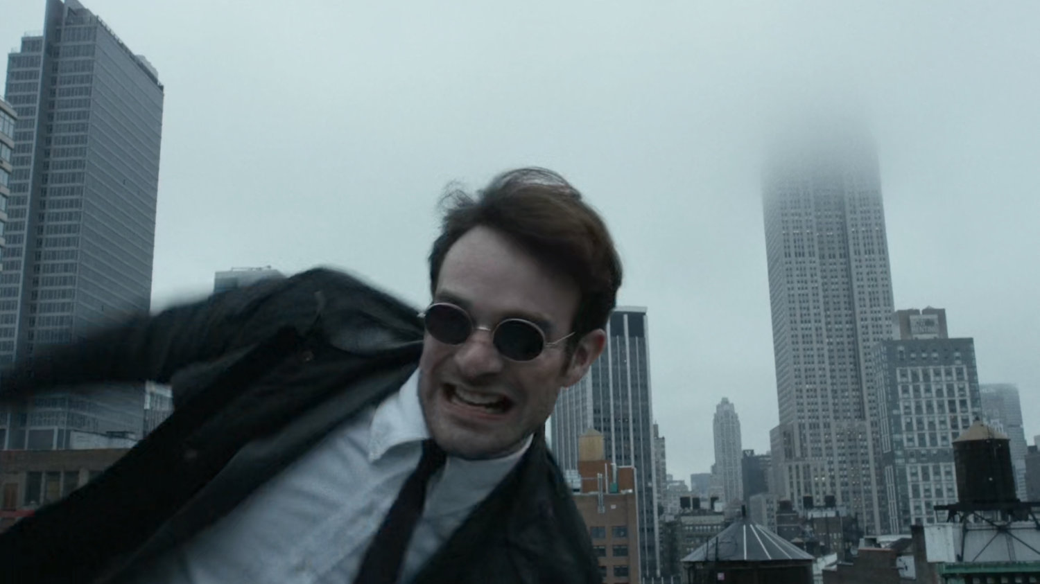 Matt vaults onto New York rooftop.
