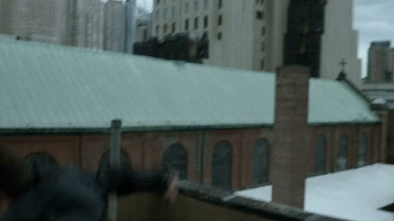 Matt runs across New York rooftop.