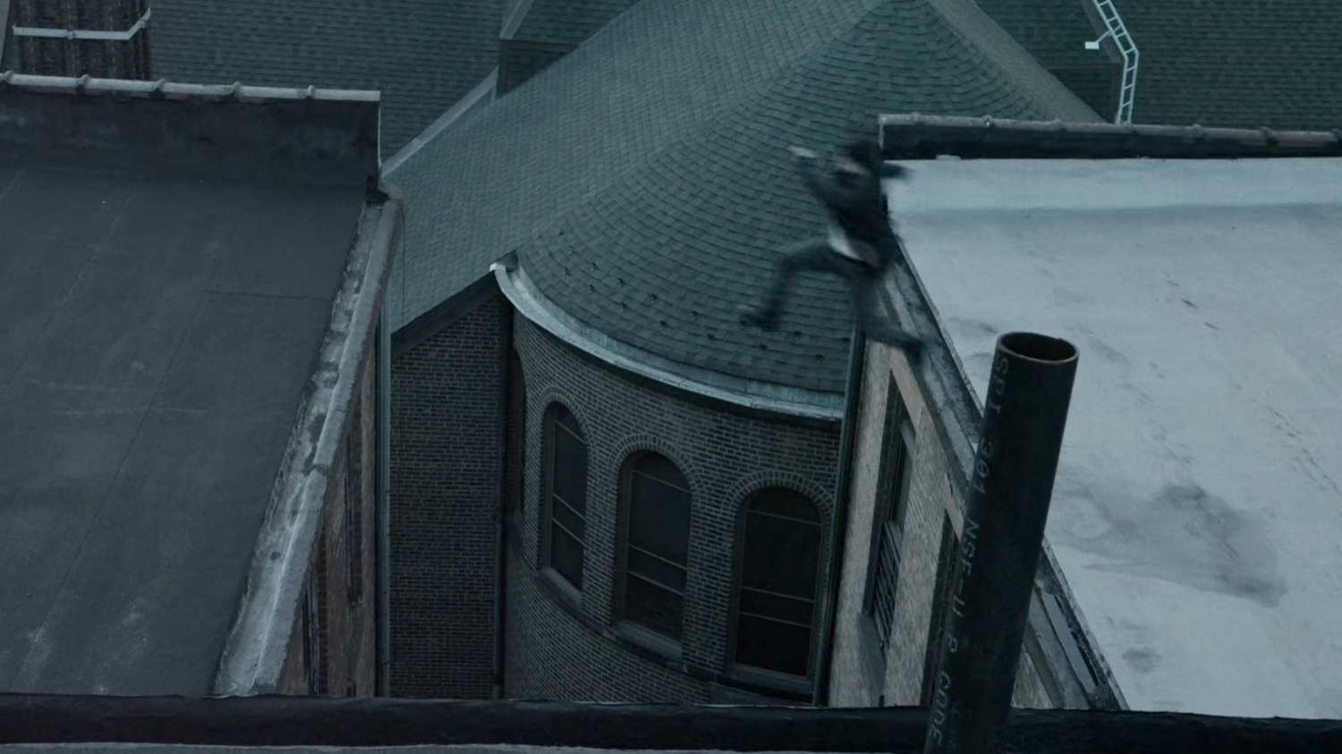 Matt leaps between New York rooftops.