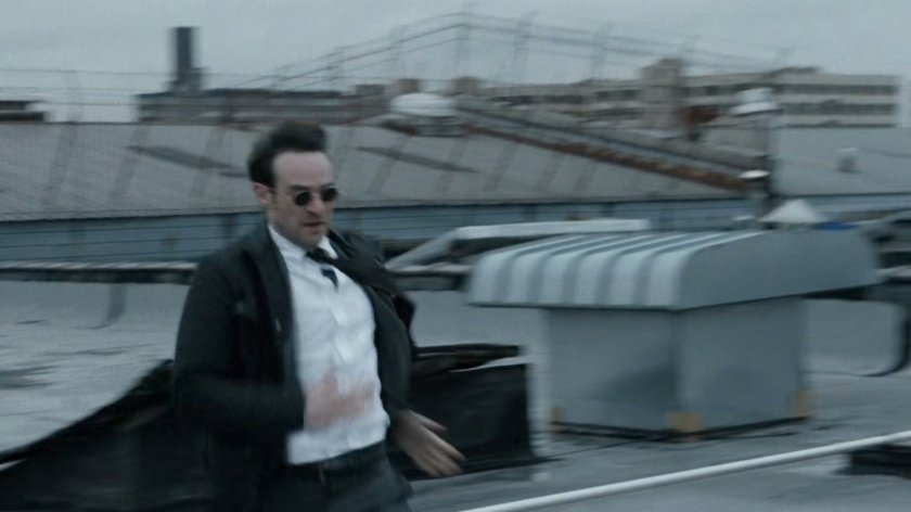 Matt runs across New York rooftop.