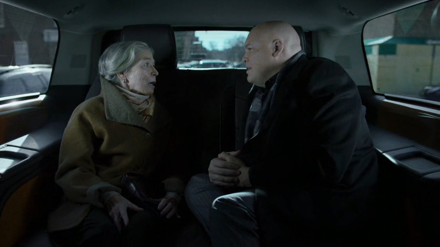 Fisk and his mother in the back of a car.