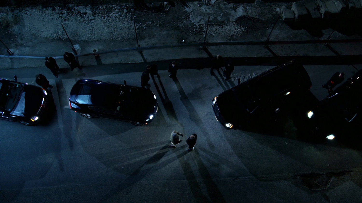 Aerial of cars outside dockside discussion.