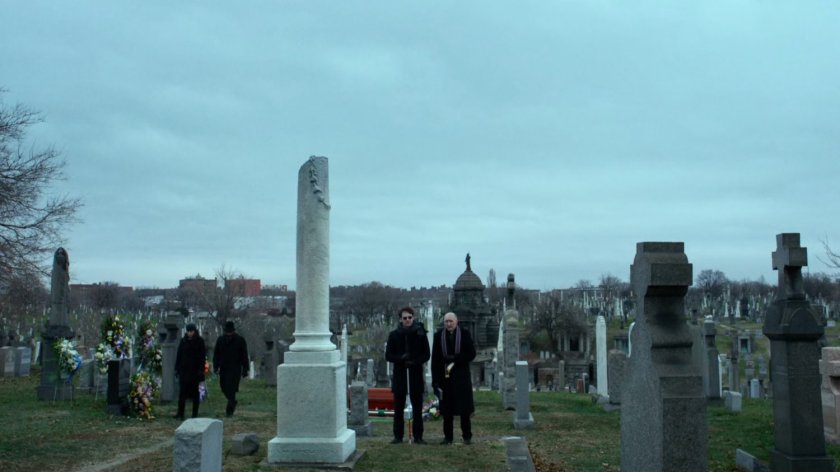 Matt and Father Lantom at cemetery.