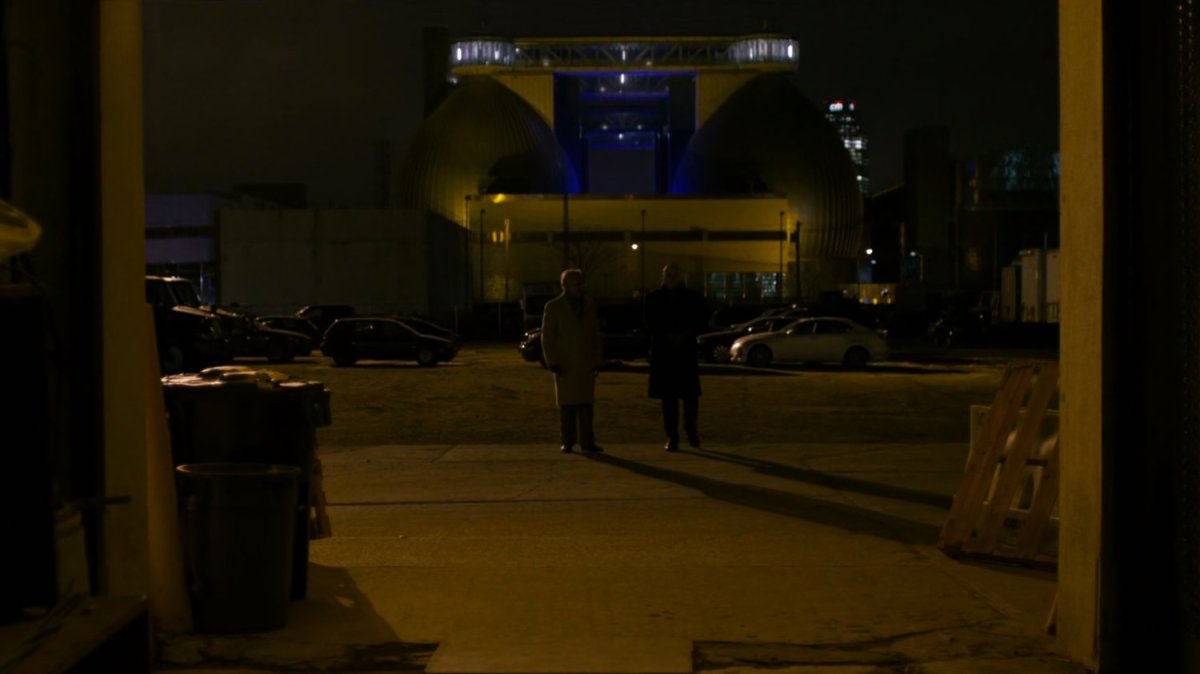 Leland and Fisk approach a garage.