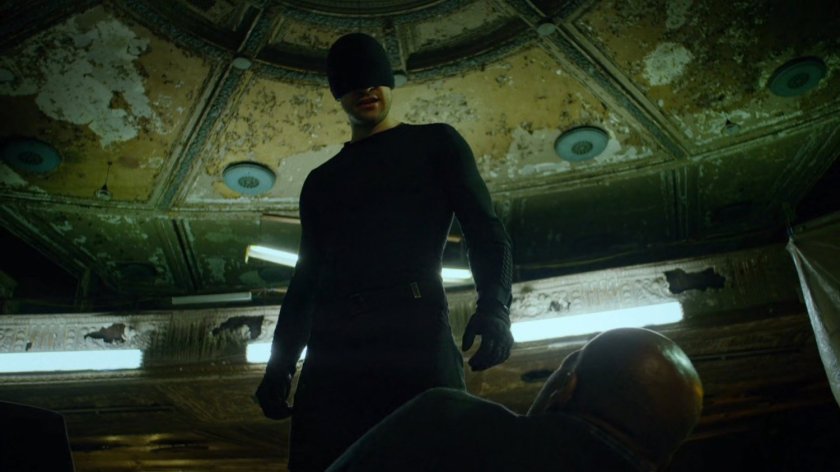 The Man in Black and Detective Hoffman inside abandoned theater.