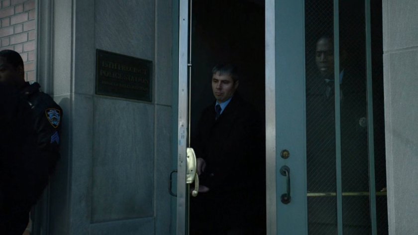 Police exiting the front of 15th Precinct.