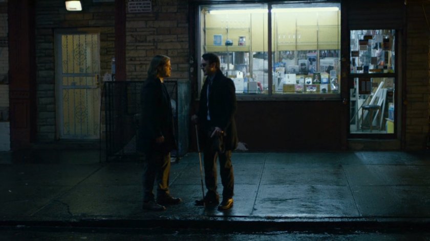 Matt and Foggy on sidewalk outside Nelson and Murdock office building.