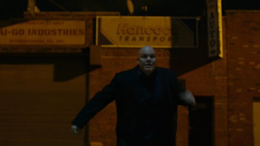 Fisk running into alleyway.