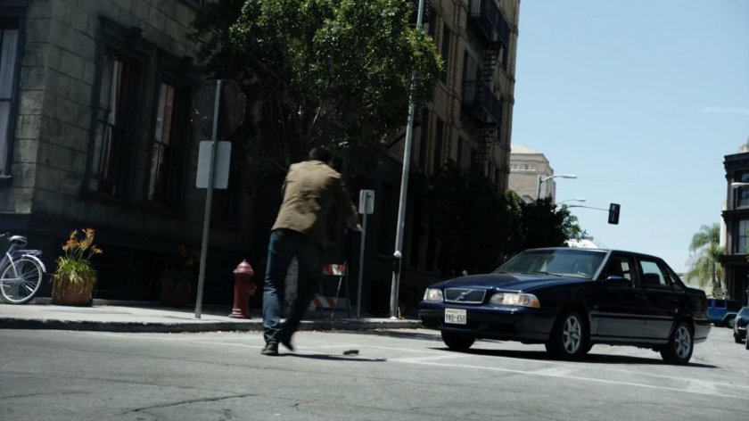 Man running through a Seattle intersection.