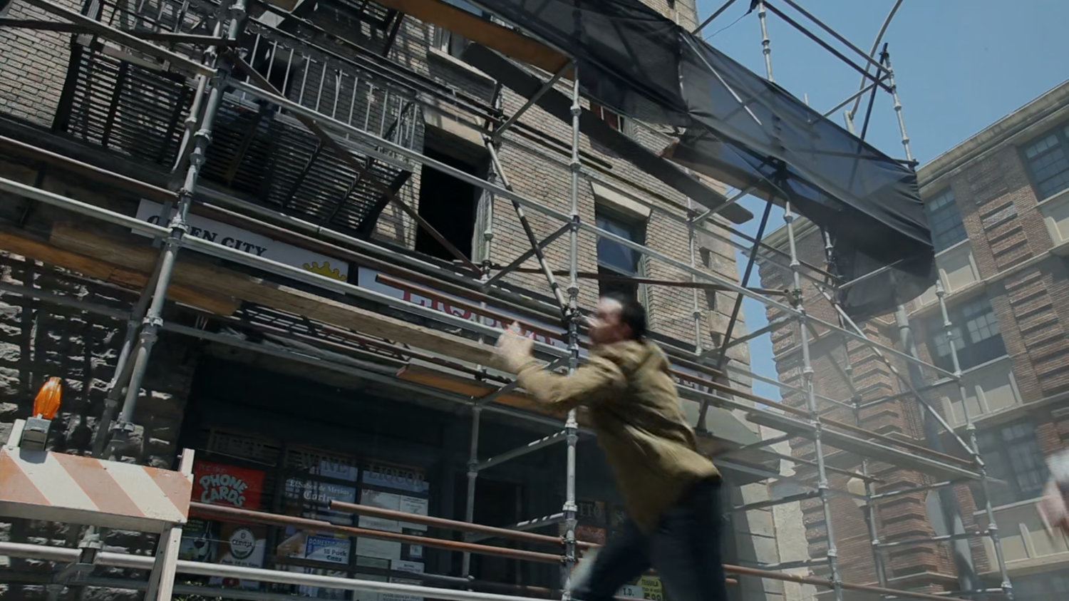 Joey dodges falling scaffolding in Seattle neighborhood.