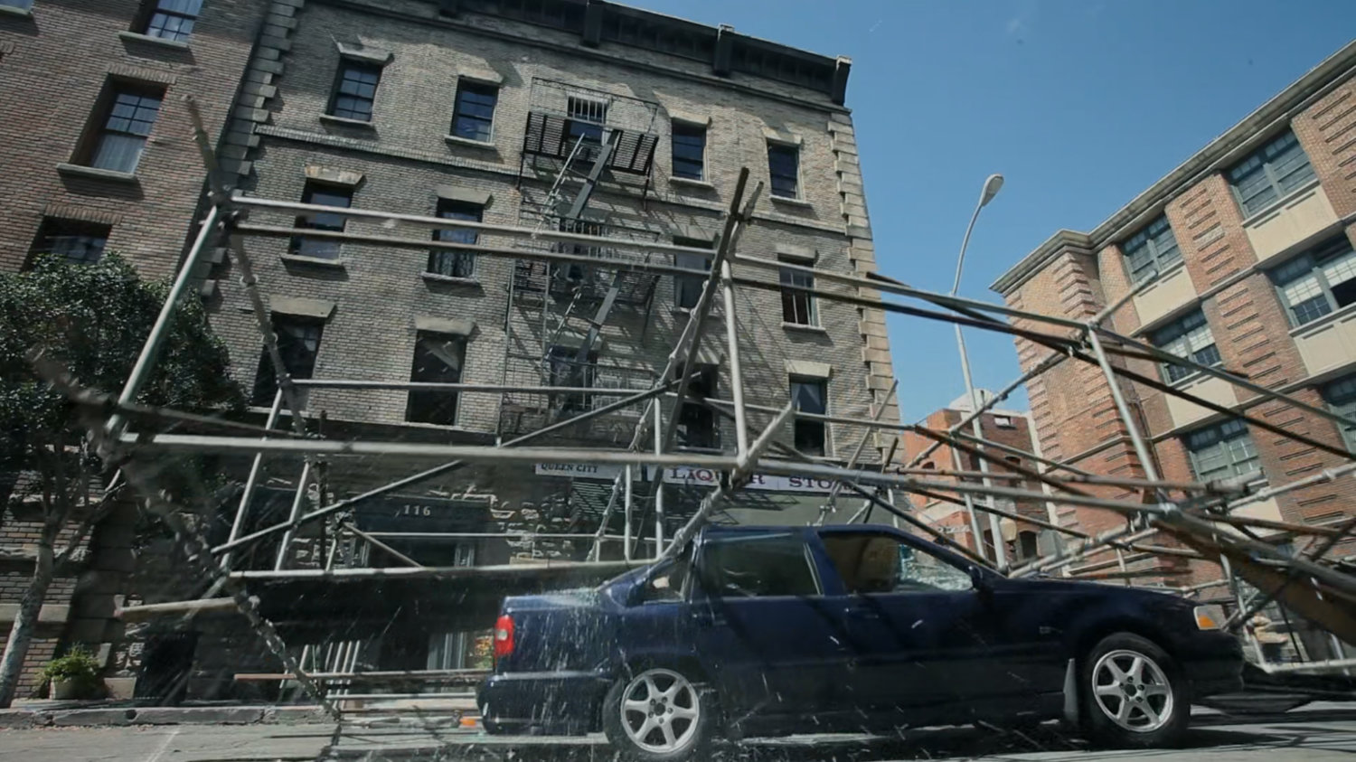 Scaffolding falls on a car in Seattle neighborhood.
