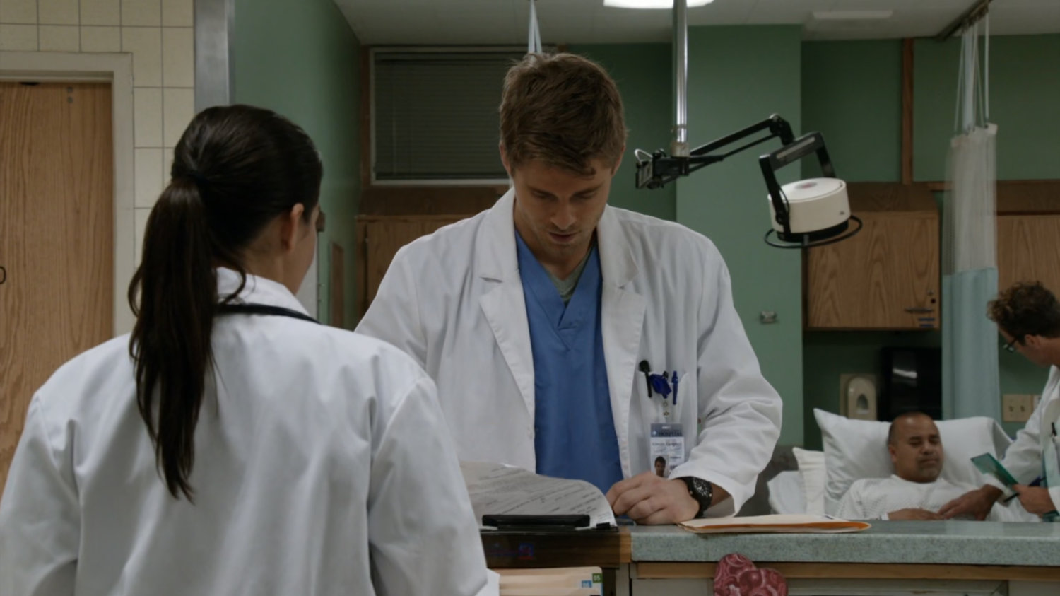 Lincoln at a nurses station in hospital.